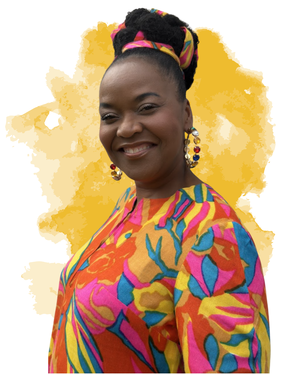 A smiling Black woman wears a colorful patterned outfit and headwrap, standing against a soft yellow background.
